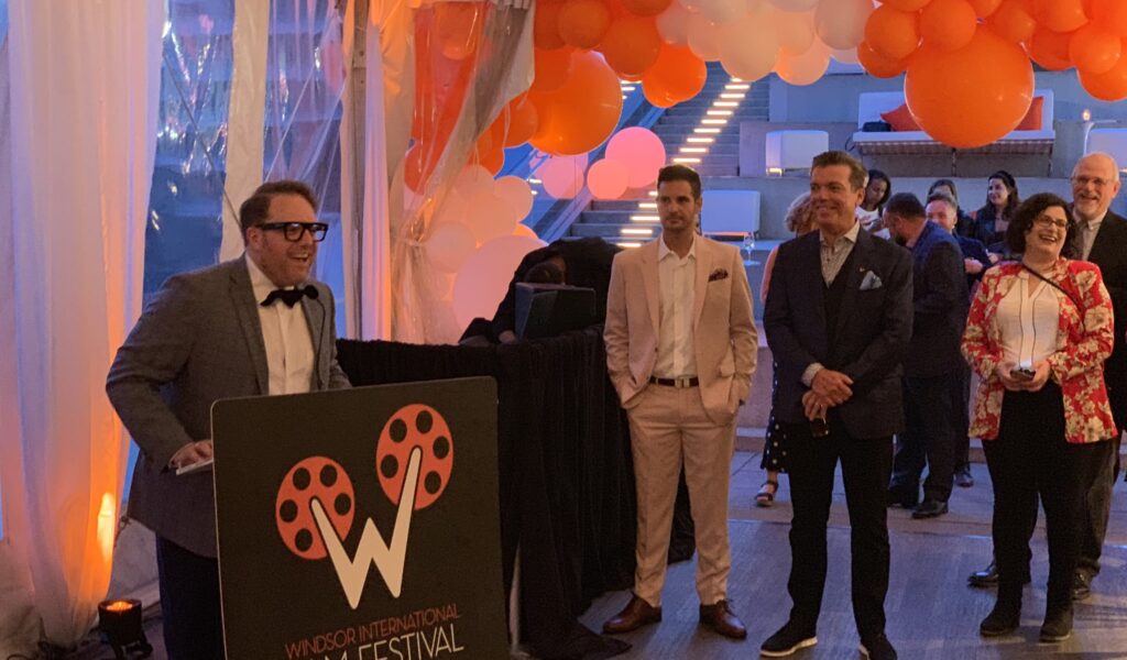 Vincent Georgie addresses the crowd at the WIFF x TIFF party in Toronto on Sept. 12, 2019.